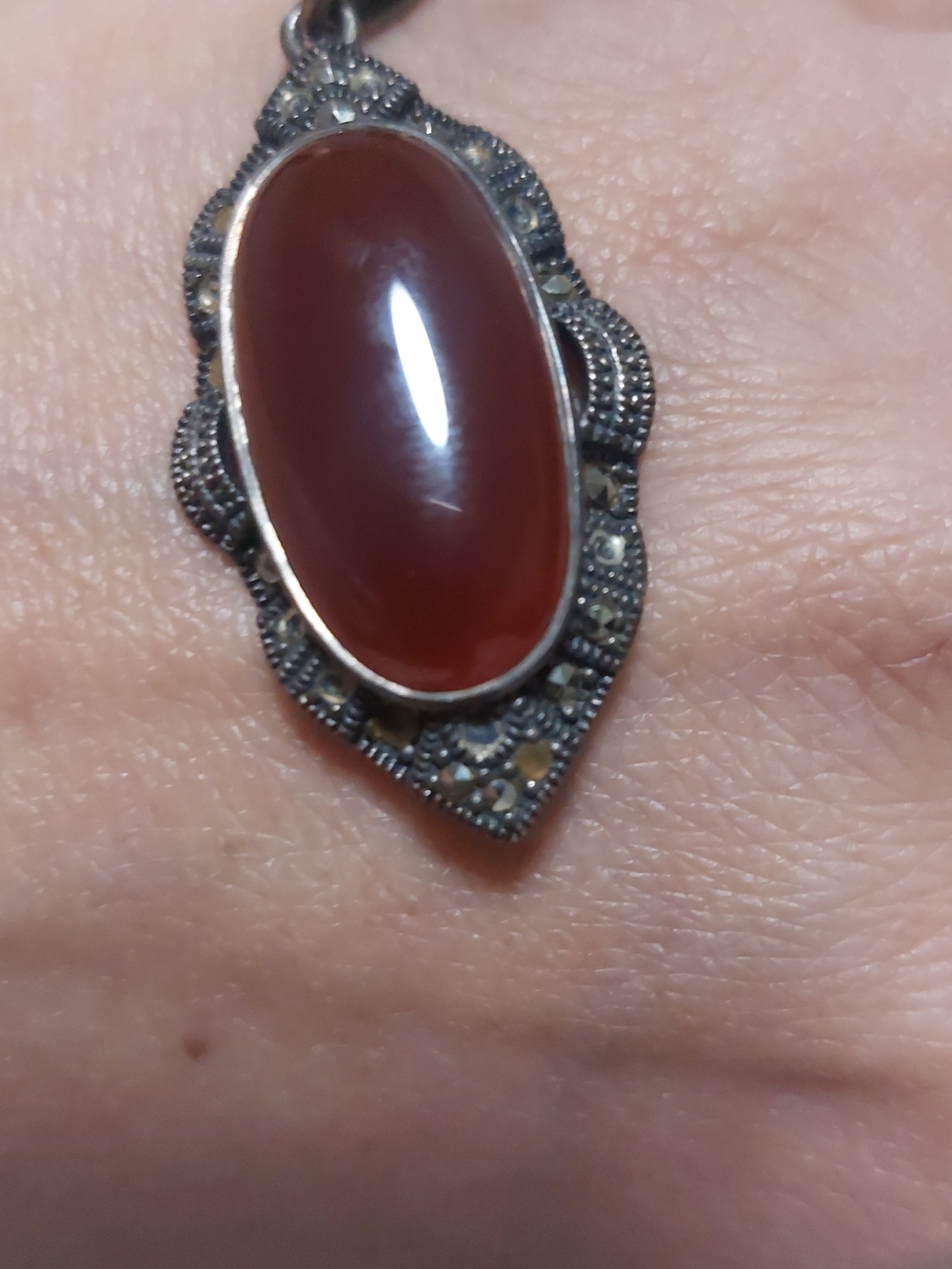 Vintage-Inspired Carnelian Ring in Warm Red with Ornate Silver Setting